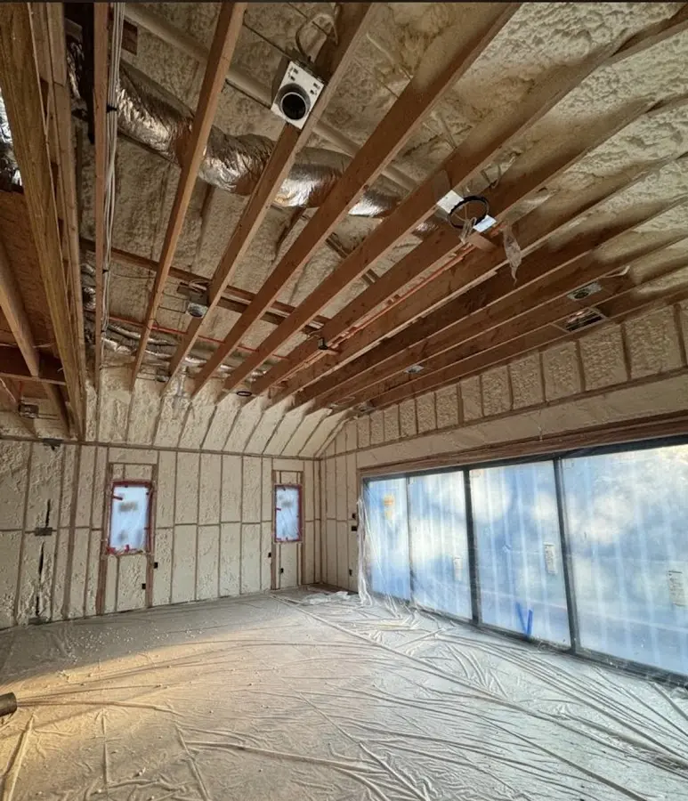 Interior walls and ceiling insulated with spray foam during new construction in Cherry Creek